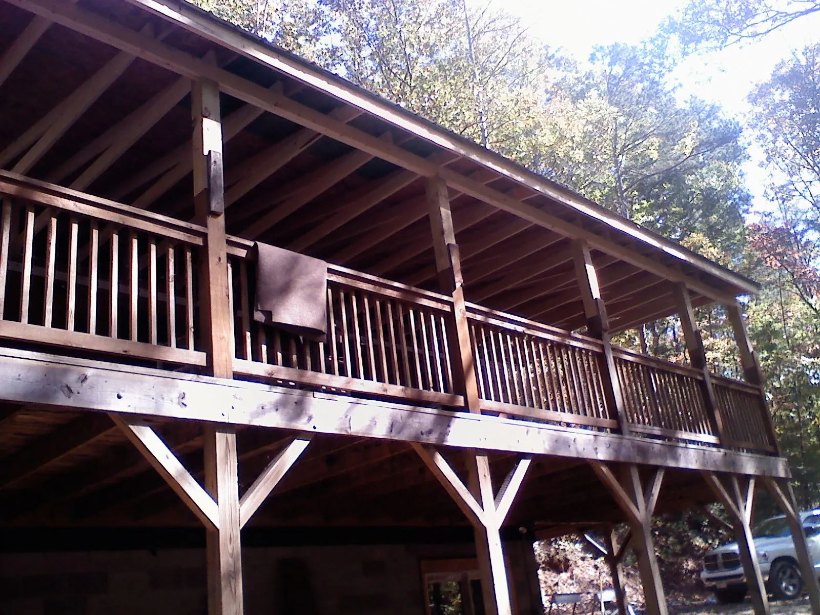 Timber framing under a new elevated porch and deck — Roof Leak Repair in North Bay by Roofing Brothers